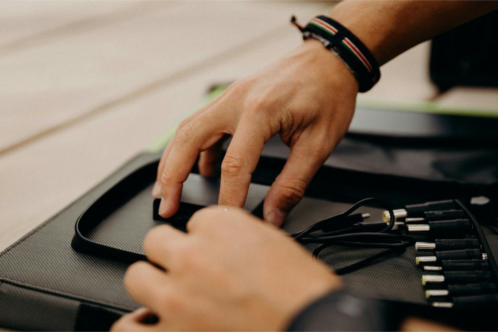 Person working on fixing hardware